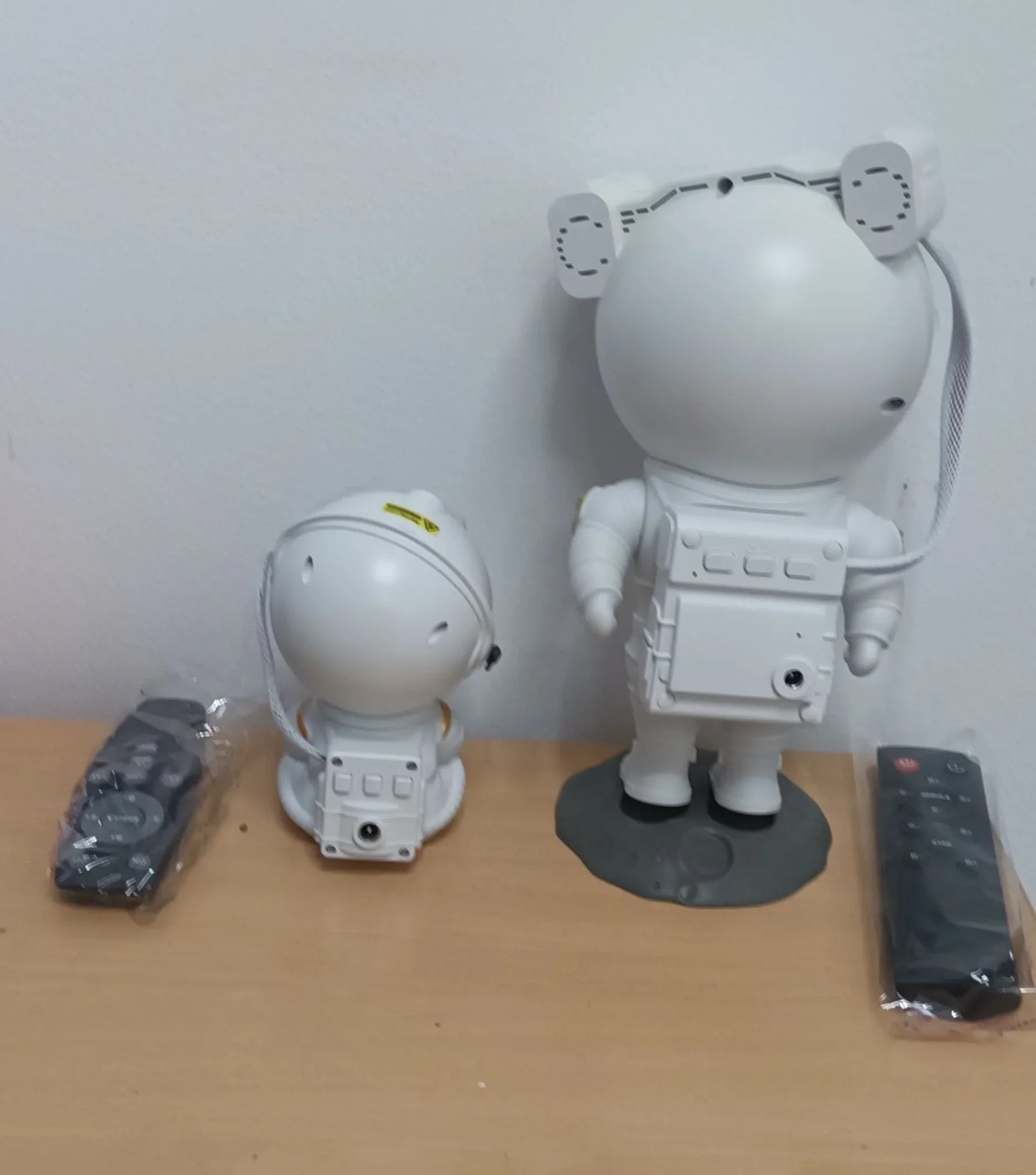 Astronaut projektor zvezdano nebo